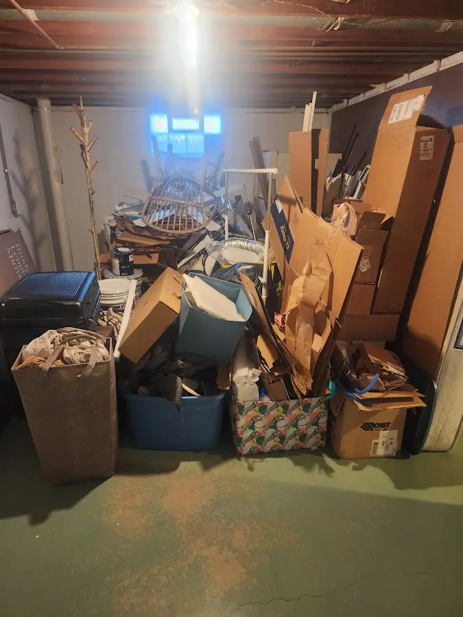 Roll-off dumpster container at job site for Yard Waste Dumpster Rental in Old Tappan